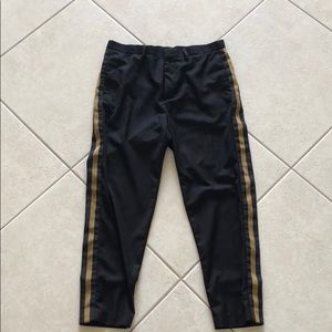 H&M black pants with gold side stripe